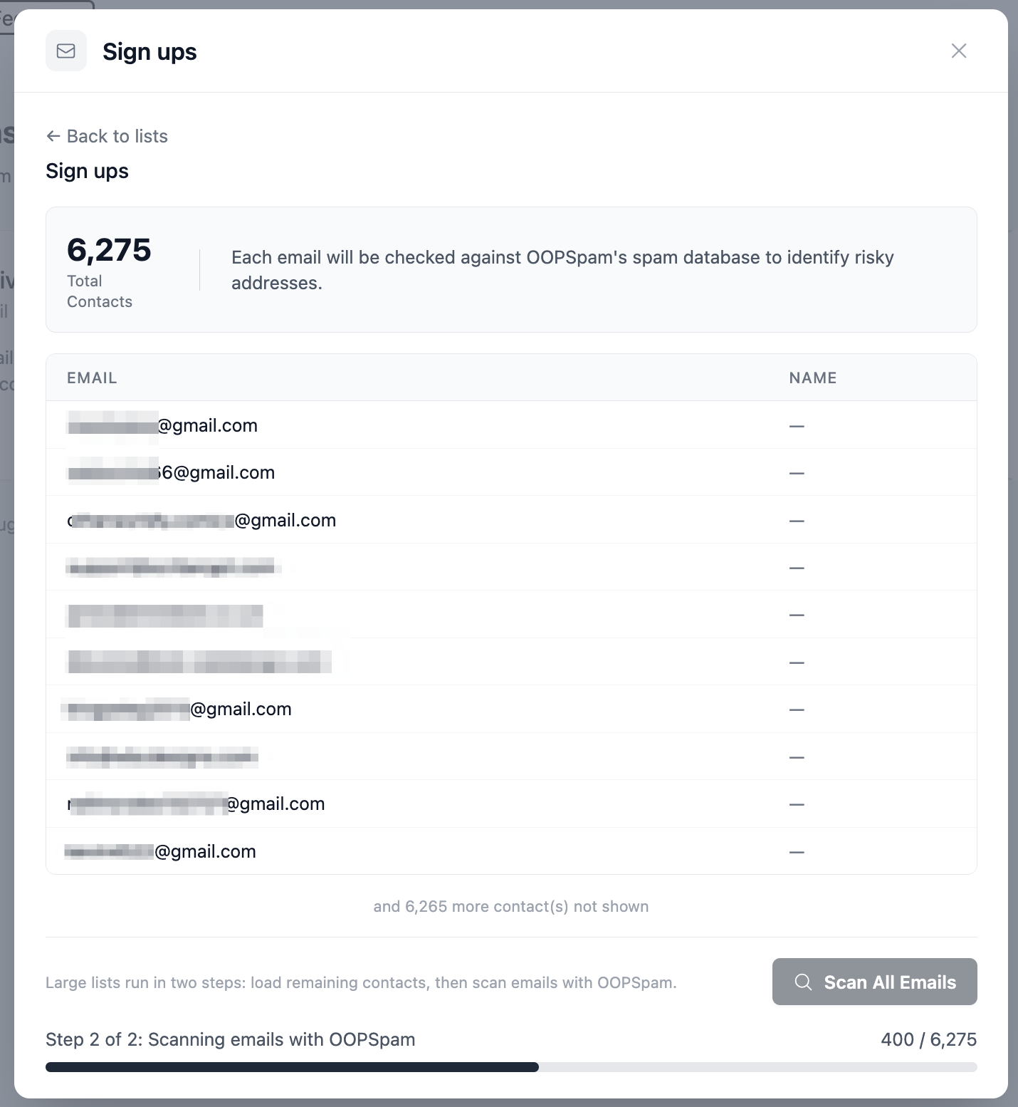 The scan runs in two steps: first it loads all contacts, then it checks each email against OOPSpam's spam database.